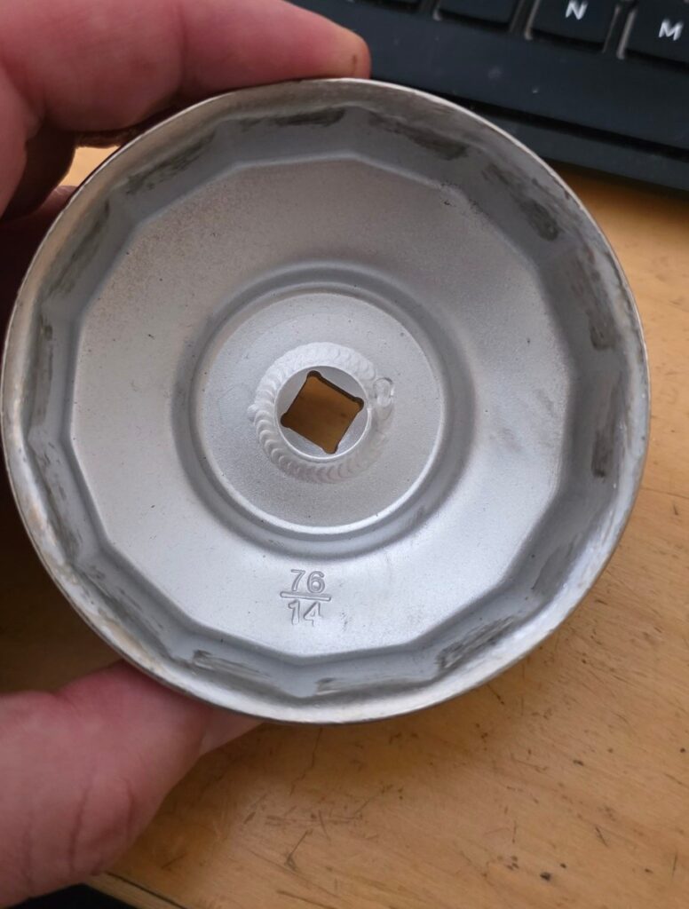 Inside of the 76mm 14-flute oil filter socket, marked 76/14